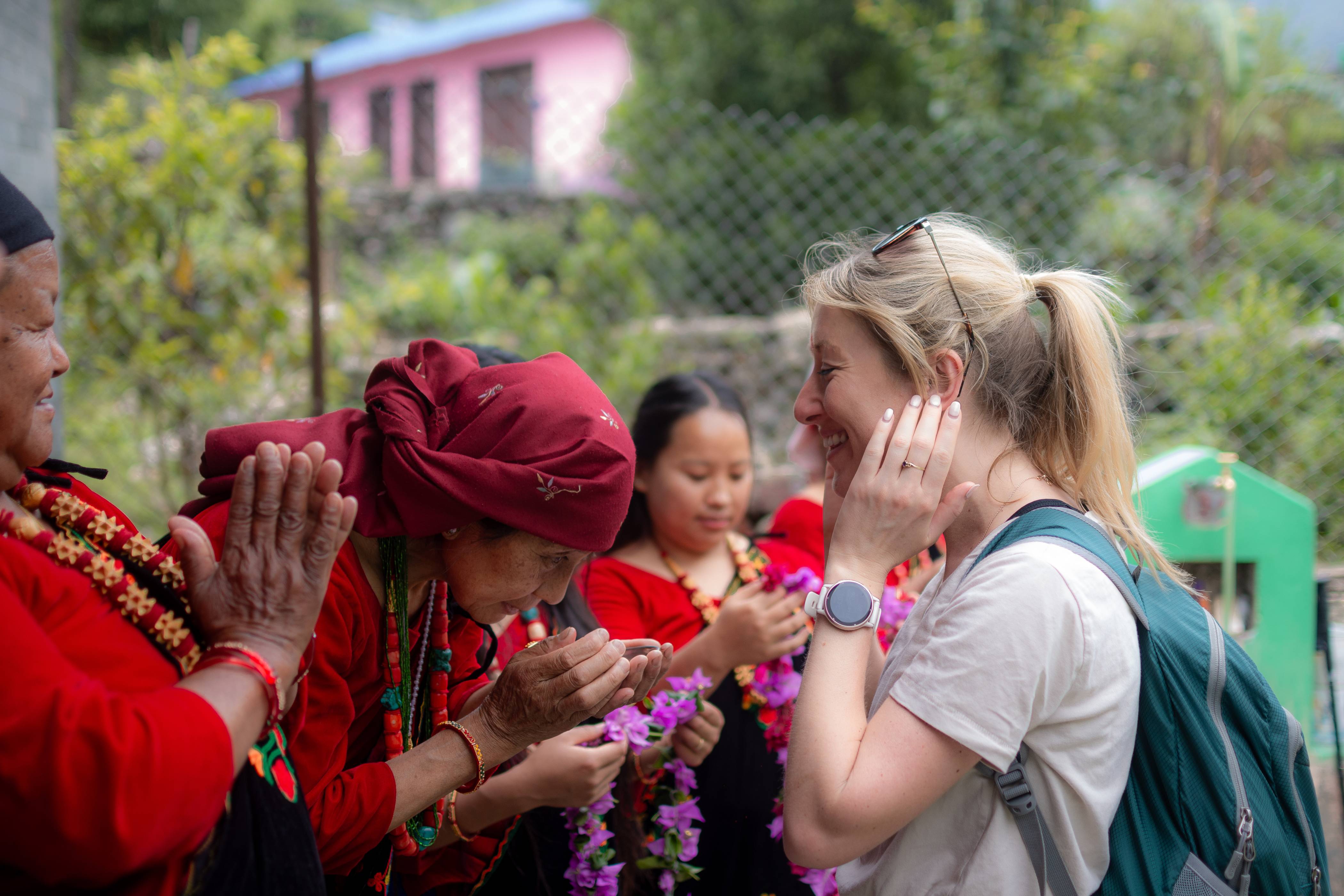 Hosts welcoming the guests at Narchyang Community Homestay.